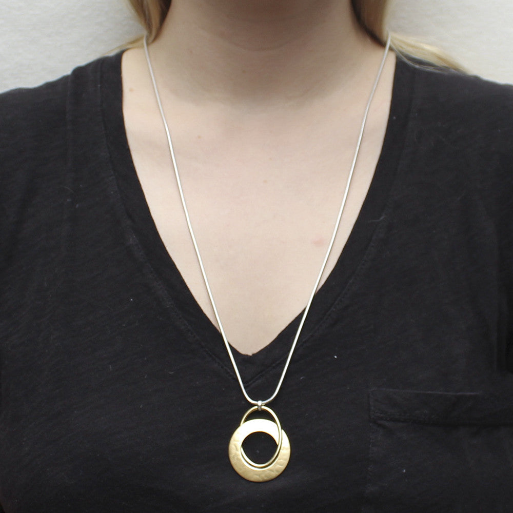 Interlocking Cutout Disc and Oval Ring Necklace