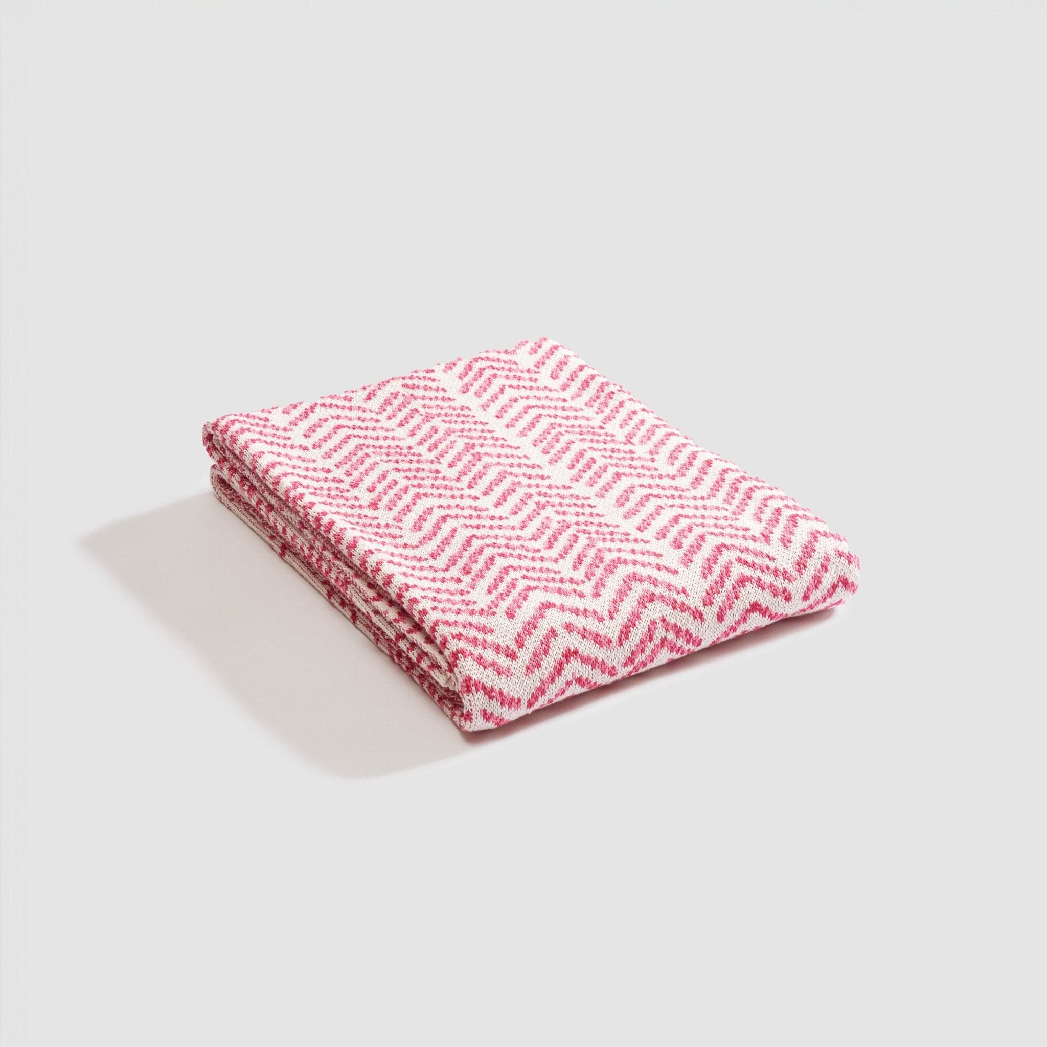 Sustainable Knit Warrior Throw Blanket - Pink